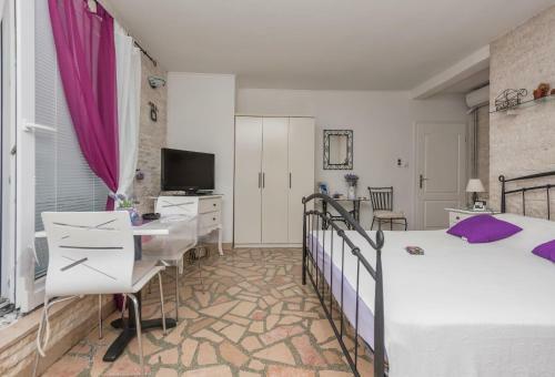 Apartmani Antunovi? Podgora