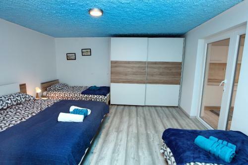 Hilltop Apartments Red & Blue