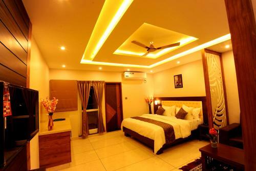 Hotel Mc Suites Mysuru