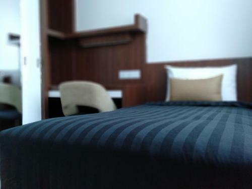 Utm Hotel & Residence