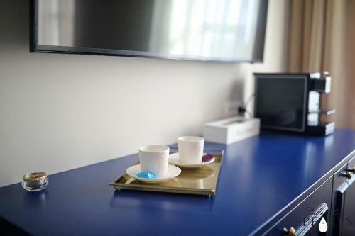 Apartamentos Three Pearls Deluxe Rooms
