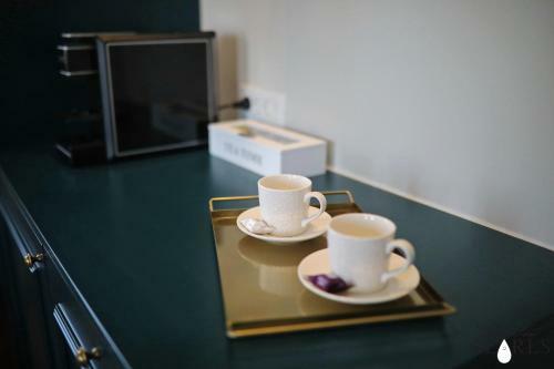 Apartamentos Three Pearls Deluxe Rooms