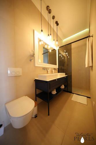 Apartamentos Three Pearls Deluxe Rooms