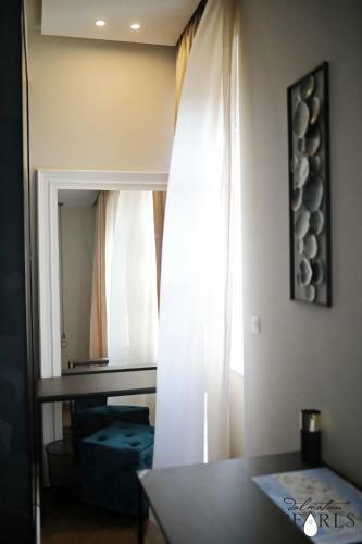 Apartamentos Three Pearls Deluxe Rooms