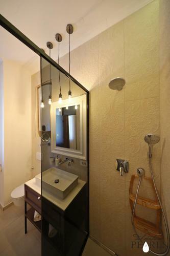 Apartamentos Three Pearls Deluxe Rooms
