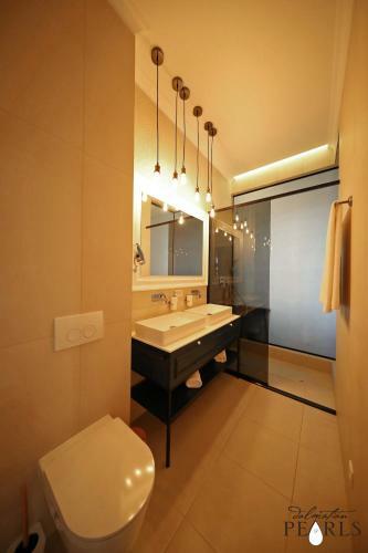 Apartamentos Three Pearls Deluxe Rooms