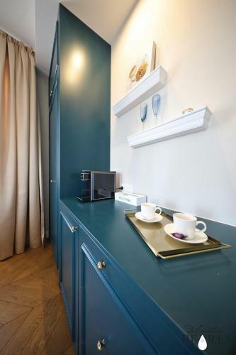 Apartamentos Three Pearls Deluxe Rooms