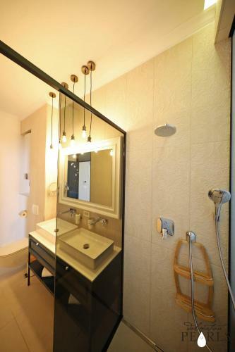 Apartamentos Three Pearls Deluxe Rooms