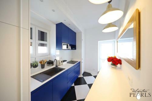 Apartamentos Three Pearls Deluxe Rooms
