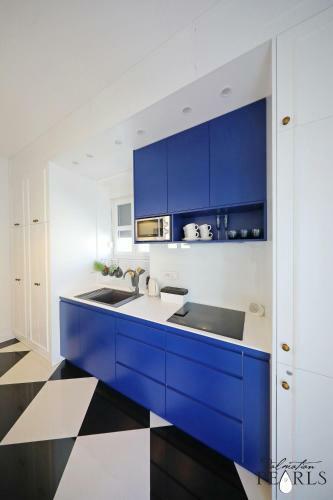 Apartamentos Three Pearls Deluxe Rooms