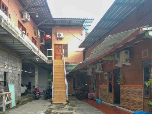 Hostal Paviliun Bu Sinta Redpartner