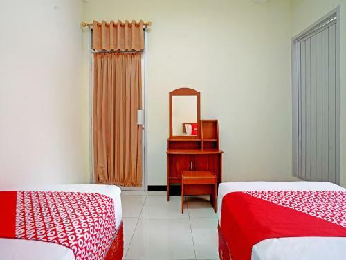 Hotel Oyo 90836 Bartu Guesthouse
