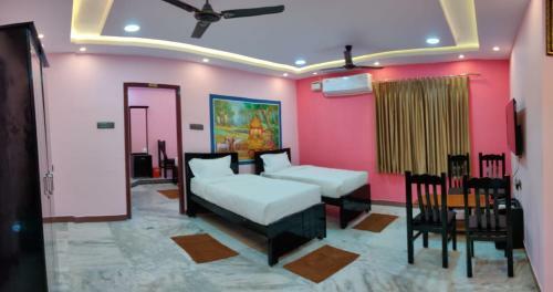 Hotel Temple Stay - Uma Residency And Guest House