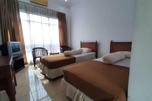 Hotel Akbar Syariah Banyumas Redpartner