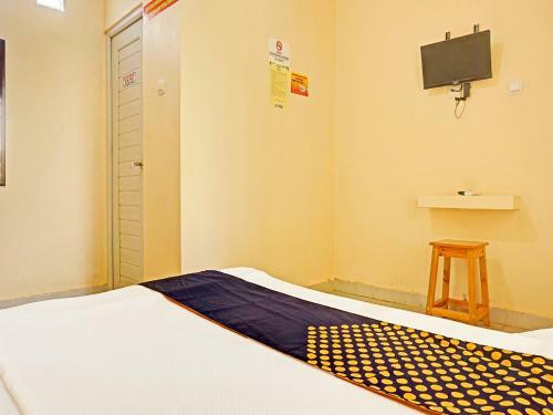 Hotel Spot On 91461 Saungawi Stay Syariah