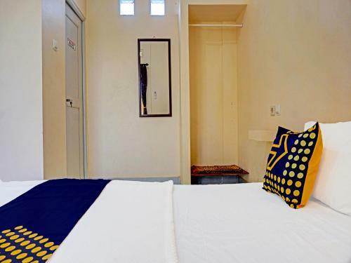 Hotel Spot On 91461 Saungawi Stay Syariah