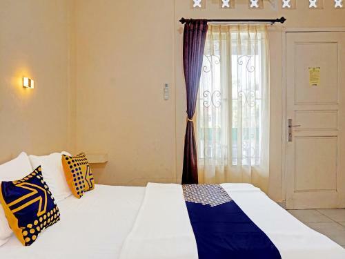 Hotel Spot On 91461 Saungawi Stay Syariah