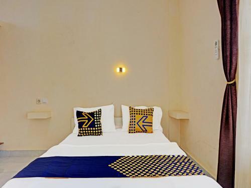 Hotel Spot On 91461 Saungawi Stay Syariah