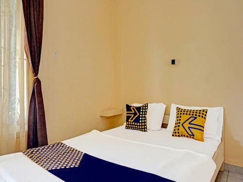 Hotel Spot On 91461 Saungawi Stay Syariah