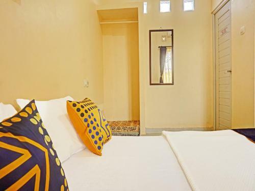 Hotel Spot On 91461 Saungawi Stay Syariah