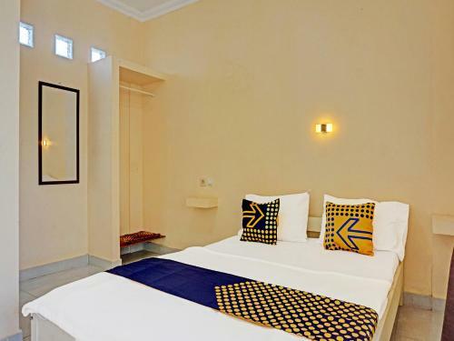 Hotel Spot On 91461 Saungawi Stay Syariah