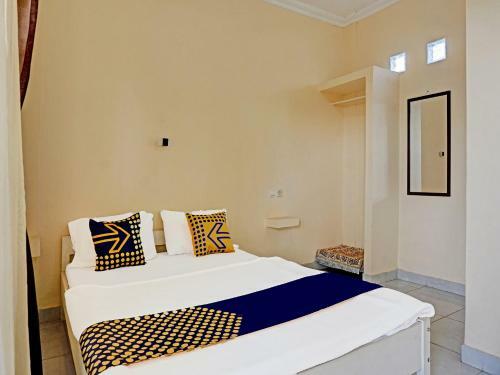 Hotel Spot On 91461 Saungawi Stay Syariah