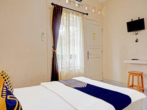 Hotel Spot On 91461 Saungawi Stay Syariah