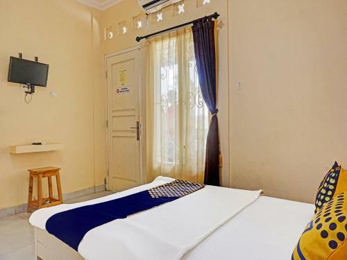 Hotel Spot On 91461 Saungawi Stay Syariah