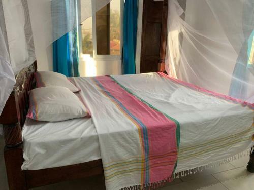 Apartamento Breezy African Inspired Two Bedroom Flat.