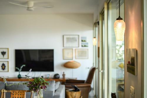 Sunny Architectonic Apartment With Green Terrace