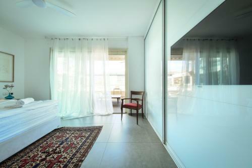 Sunny Architectonic Apartment With Green Terrace