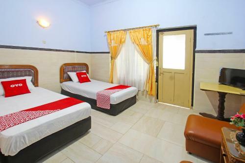 Oyo 91516 Wisata Hotel