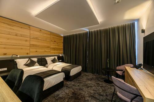 B The Hotel