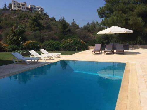 Holiday Sea View Apartment With Garden And Shared Pool