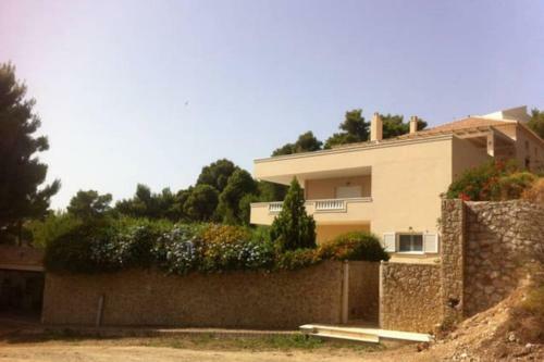Holiday Sea View Apartment With Garden And Shared Pool