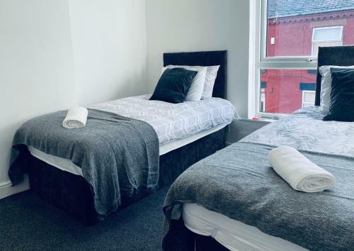 Apartamento 10 Mins From Manchester City Ctr 4-bedroom House