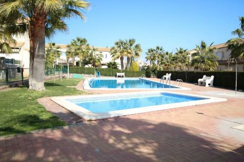 Casa De Vacaciones Con Piscina Comunitaria