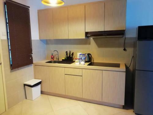 Apartamento Singgahsini Suite @ Atlantis Residences