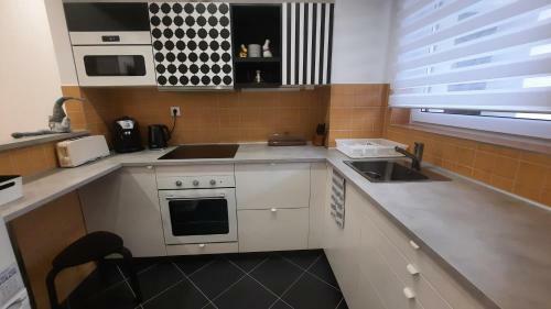 Disztingv�lt Apartman