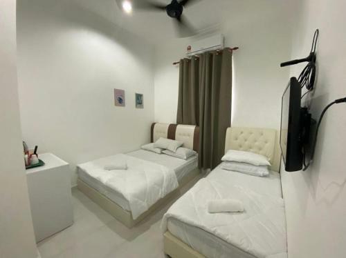 Hostal Dsinggahpcb Guest House