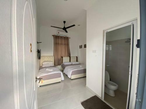 Hostal Dsinggahpcb Guest House