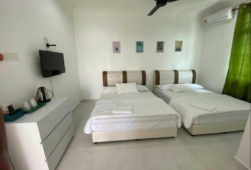 Hostal Dsinggahpcb Guest House