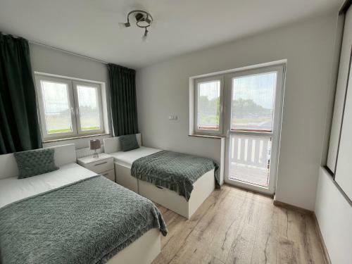 Apartamenty ?per?owe Zacisze?