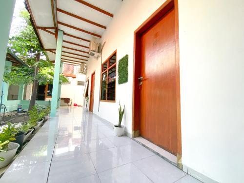 Hostal Homey Guesthouse Kertajaya (syariah)
