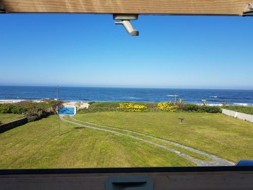 Casa De Madeira Na Praia