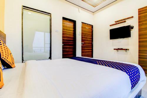 Hotel Spot On 79399 Om Residency Classic