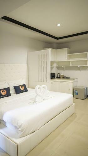 Hotel Roomquest Nichada Isb International