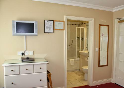 Hostal The Moorings Guesthouse & Seafood Restaurant