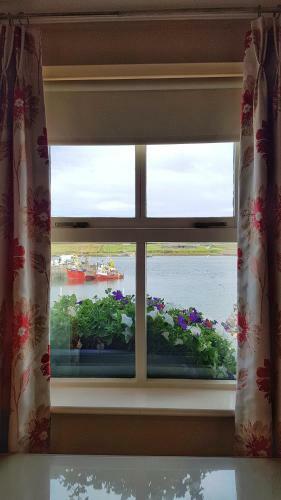 Hostal The Moorings Guesthouse & Seafood Restaurant