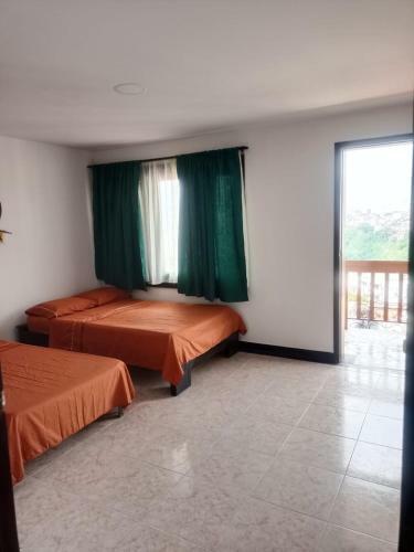 Hostal La Iguana Caf� Y M�s